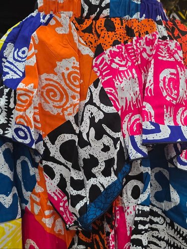 Colorful patterned skirt on a mannequin in a store setting