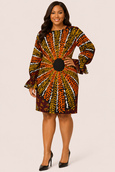 Woman wearing a patterned dress on a plain background