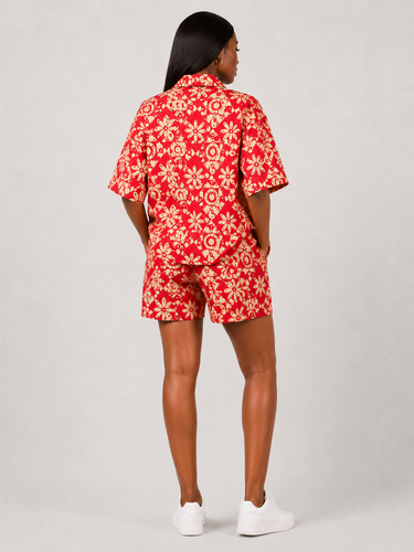 Red Ankara print women's matching set with camp collar oversized shirt and high waist shorts in coordinated African geometric print fabric perfect for summer and festival outfits