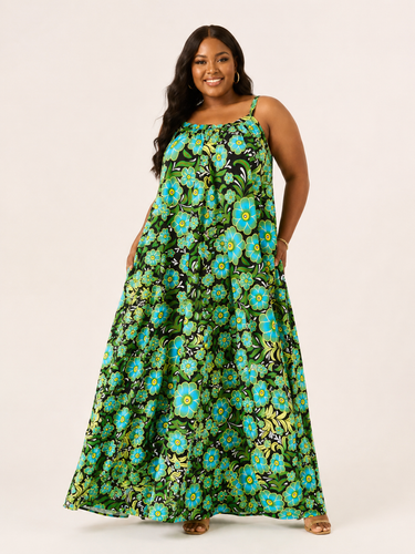 Woman wearing a green floral dress on a beige background