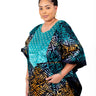 Full-length view of multicolor Adire kaftan dress