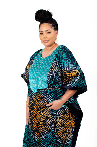 Full-length view of multicolor Adire kaftan dress