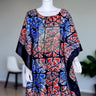 Adire free-flow gown with red, blue, and black geometric patterns