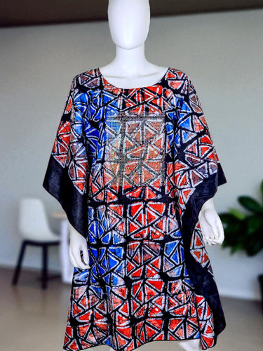 Adire free-flow gown with red, blue, and black geometric patterns
