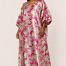 Woman wearing a floral dress on a white background