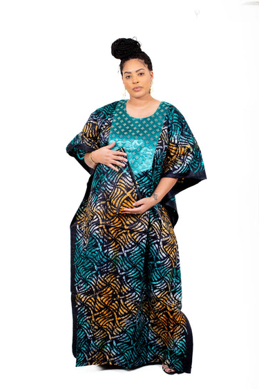 Woman wearing diamond-neck Adire Boubou Kaftan in orange front panel