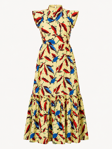 Colorful dress with bird pattern on a white background