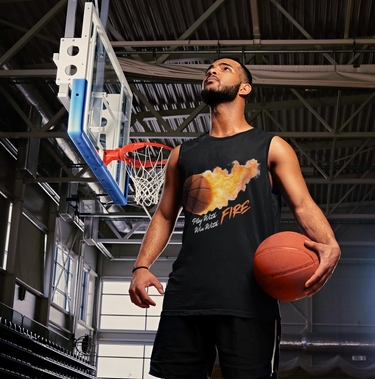 Man wearing white flame basketball tank top standing on indoor court