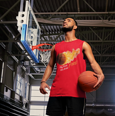 Basketball player posing confidently in fire-themed workout tank